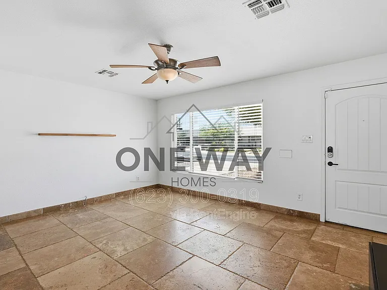 8702 E Sheridan St — Photo 5