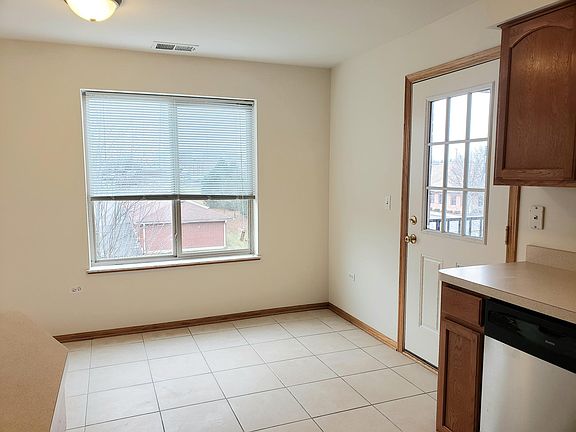 Kitchen door leads to balcony