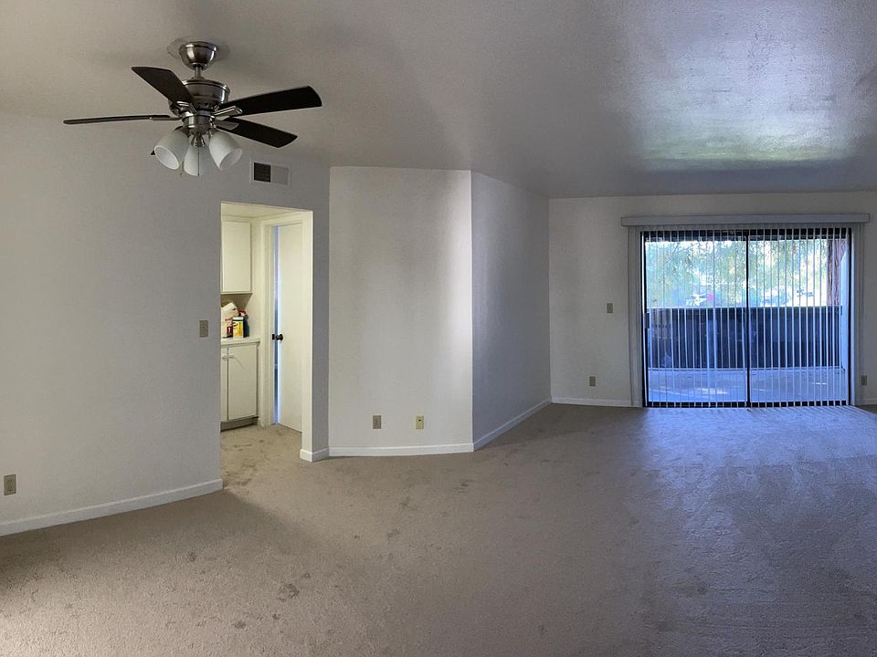 Spacious living room and dining area - New carpets throughout w/ extra thick padding