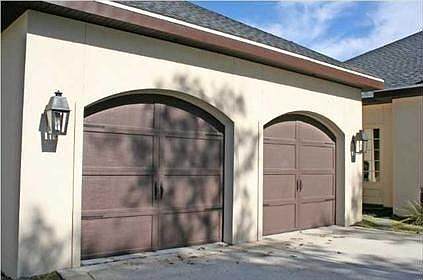No detail has been overlooked down to the carriage house garage doors and gas lanterns.