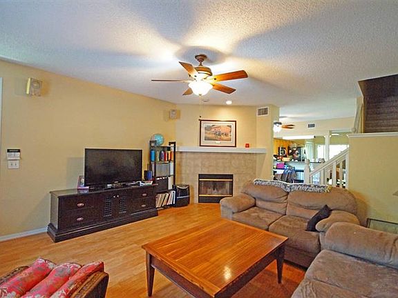 Living room with wood-burning fireplace