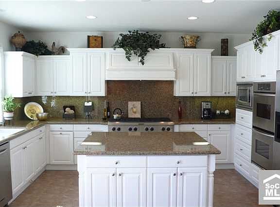 Granite counters and lots of counter space and storage. 8 Burner cooktop.