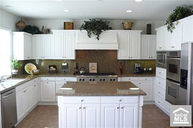Granite counters and lots of counter space and storage. 8 Burner cooktop.