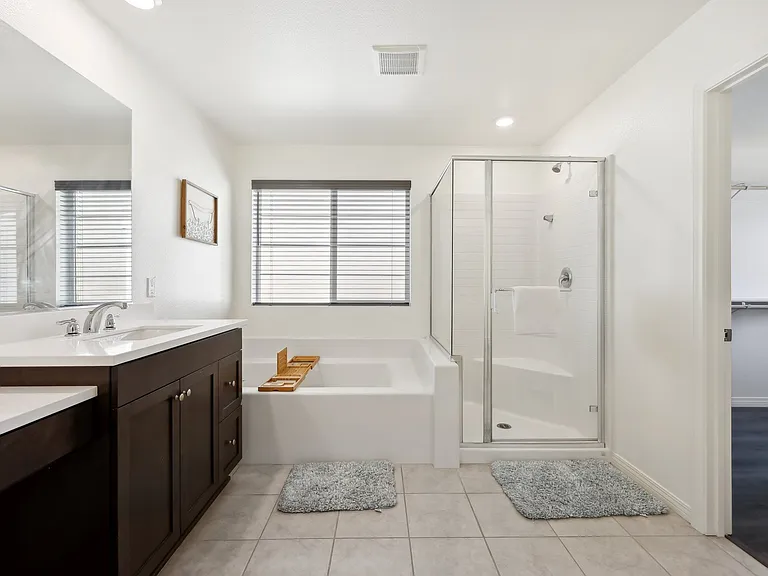 All you need in one space: a full bathroom designed for comfort and convenience!