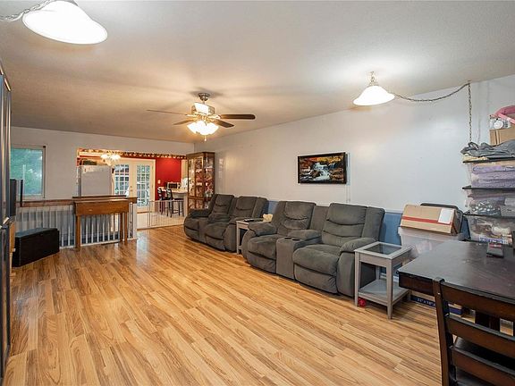 Large living room as you enter the home with nice wood flooring through out the home
