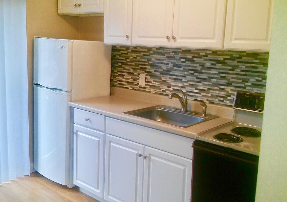 newly remodeled kitchen, with sliding glass door in the kitc