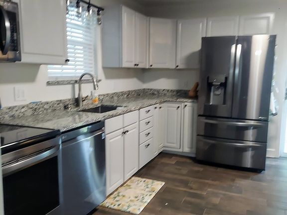Kitchen with all stainless steel appliances