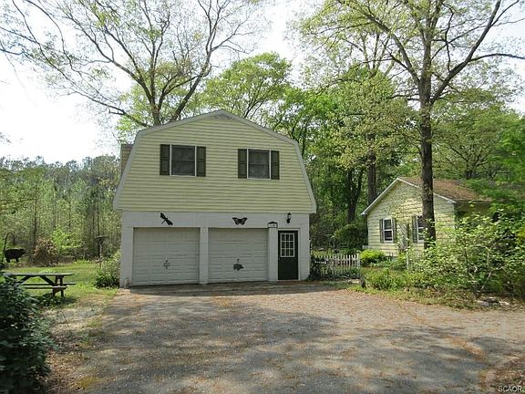 Four car garage w/ apt above
