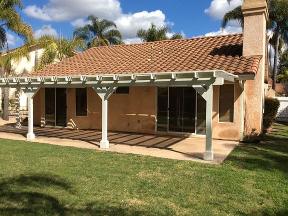 Large back yard with huge covered patio