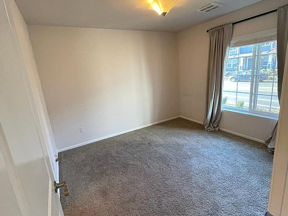 First floor bedroom is spacious, includes closet and ensuite bathroom.