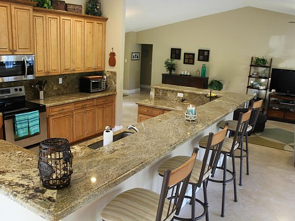 Kitchen with view to family & guest rms