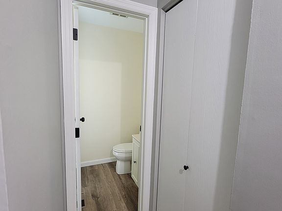 Entryway bathroom on main floor just inside garage door.