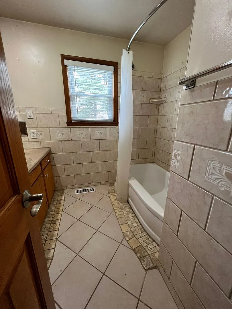 Large 5 Bedroom, 2 Bath La Crosse Rental with Two Living Areas, Garage & Central Air — Photo 3