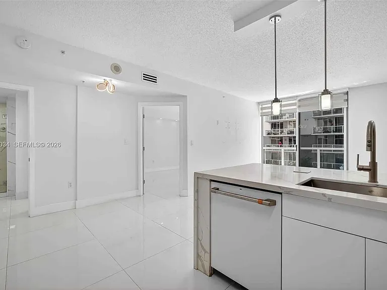 5077 NW 7th St — Photo 16