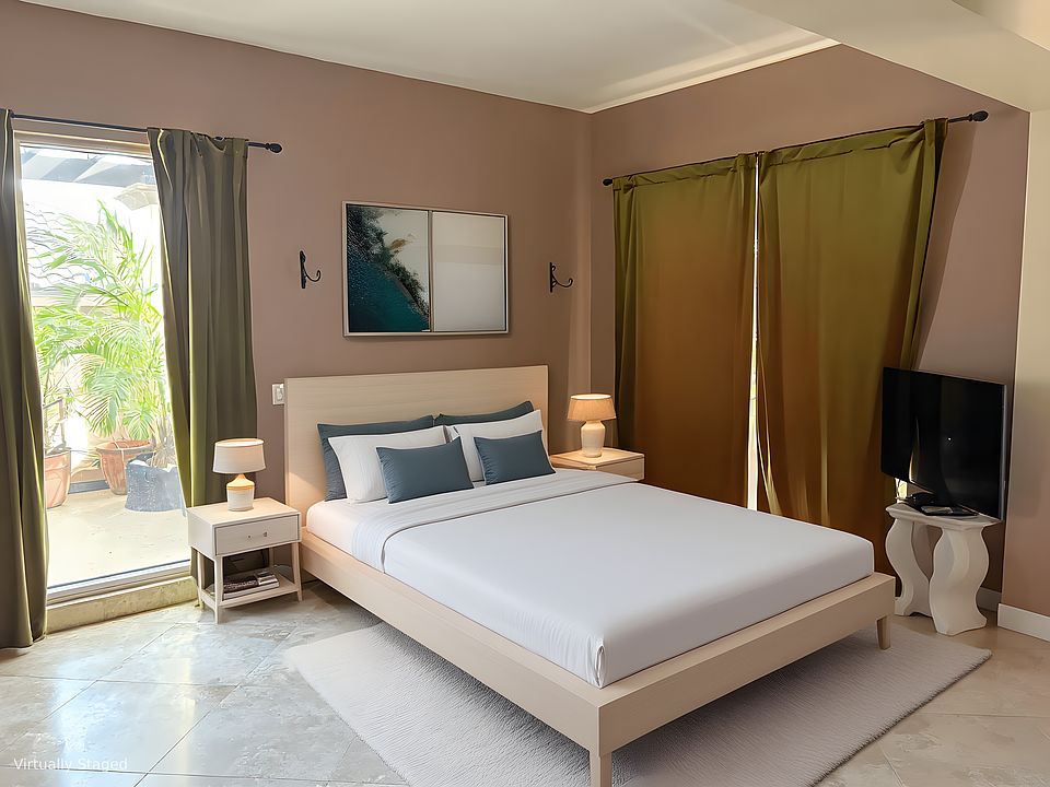 Virtually staged. Second BR with a walk in closet and en-suite bathroom (no tub)
