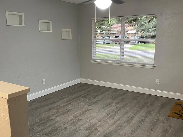 Living Room Area with cutouts in wall for decorations