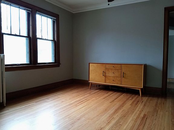 Dining room. Fresh paint. Newly finished wood floors. South facing windows.