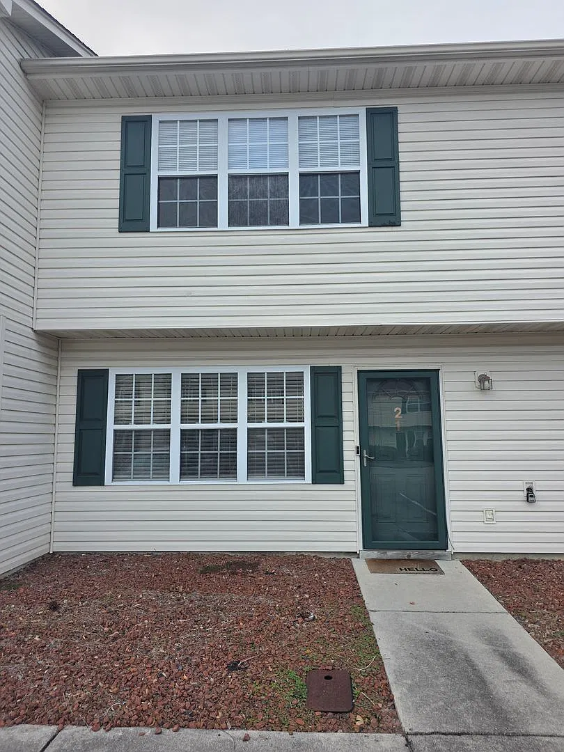 Coastal Living Made Easy 2BR/2.5BA Townhome with Pool & Clubhouse Access — Photo 1