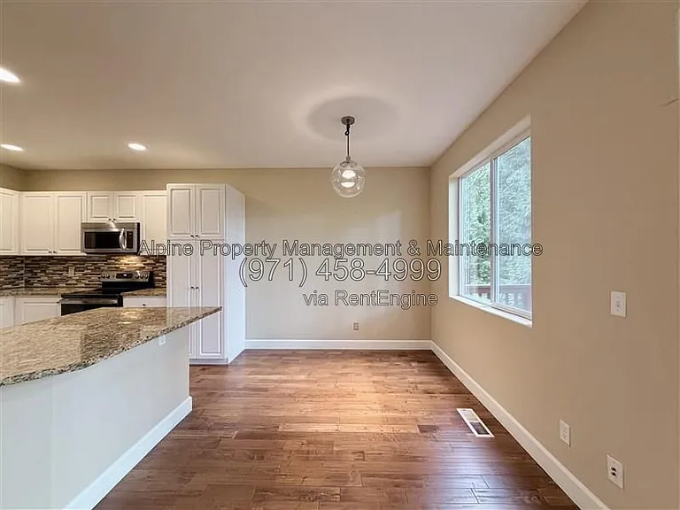 5758 NE Damsel Dr — Photo 7