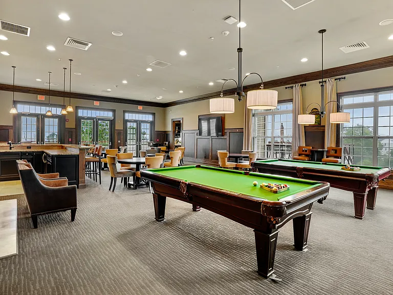 The Tavern Room at the clubhouse is the perfect space for get-togethers every day of the week - pool tables, sporting events on TV plus a granite bar and state-of-the-art kitchen. Social events like happy hour, billiards night, card clubs, etc.