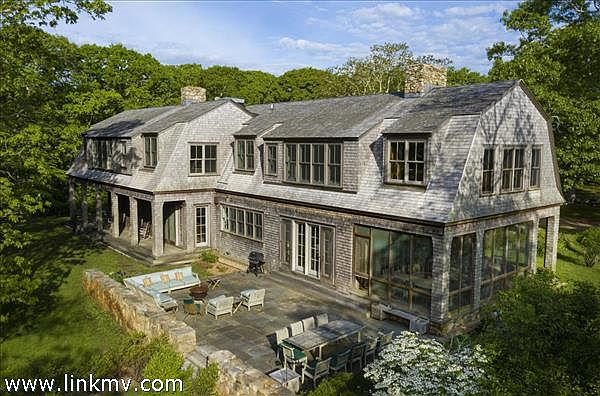 The rear of the home with lovely patio offering .....