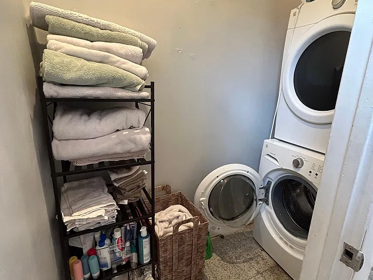 In Unit washer & dryer 
Space for cleaning supplies