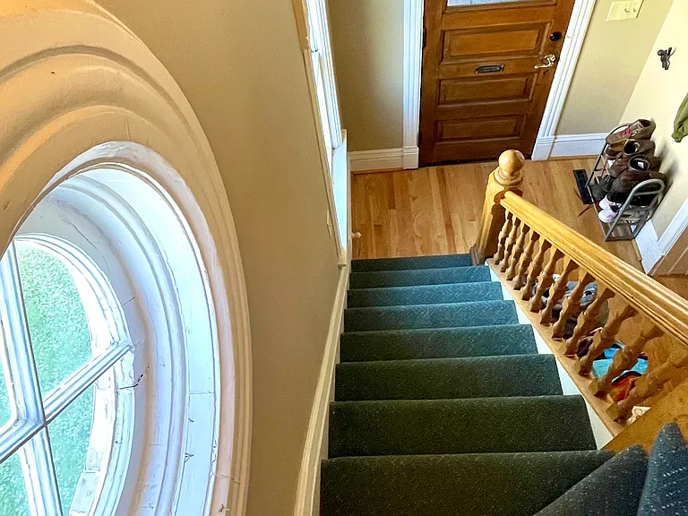 Stairway to upper unit.