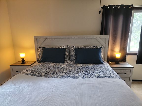 Bedroom 1 - King Size bed tons of closet space plus dresser with mirror