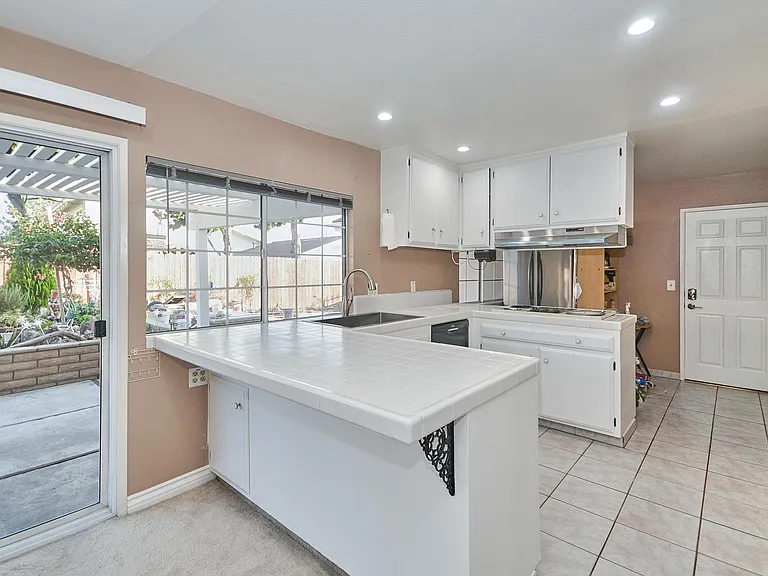 7611 Adelanto Dr — Photo 20