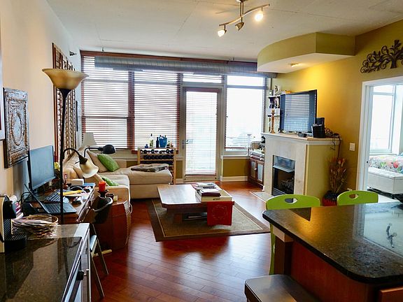 Living Room/ Breakfast Bar - wide, open layout. Lots of ligh