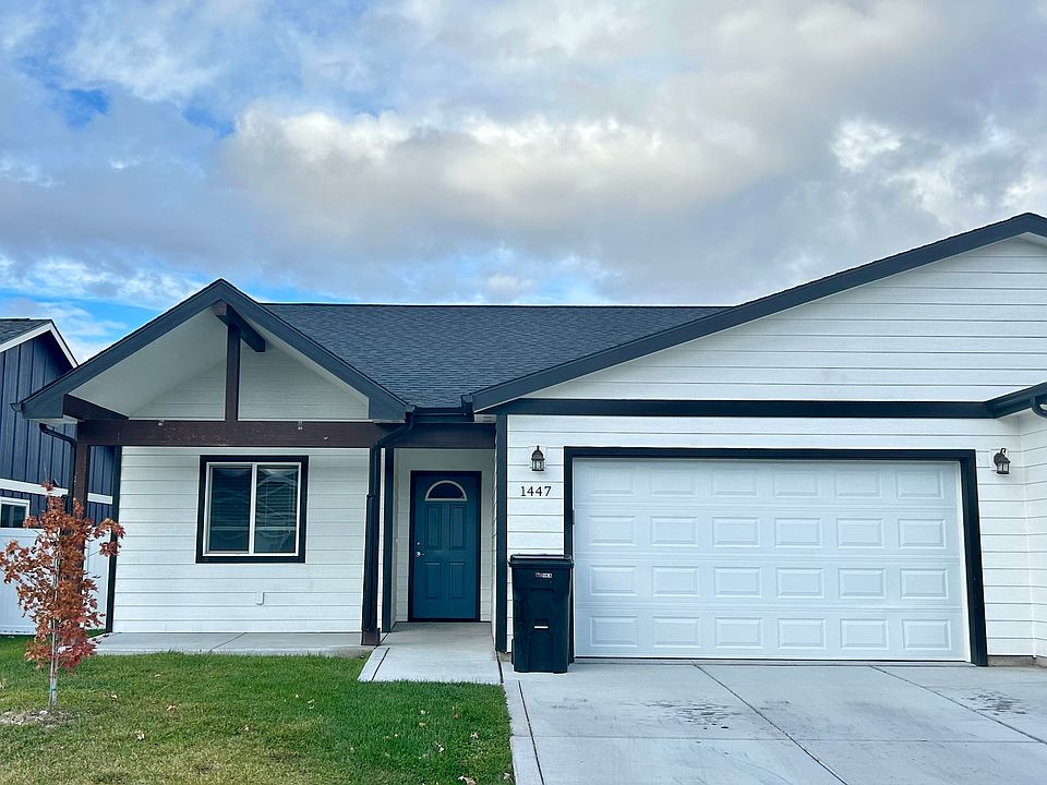 Cozy Front Porch, Double Car Garage, Plenty of Parking