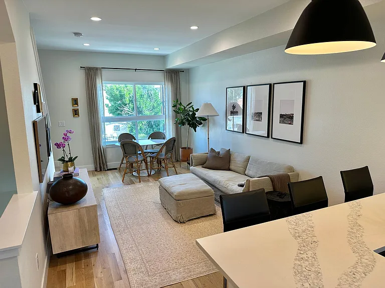 Sizeable living room with room for a table and chairs