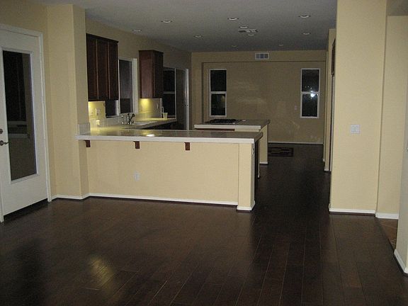 Wood floors in family room and kitchen