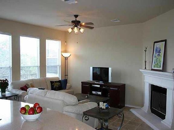 Spacious and bright family room with cozy fireplace!