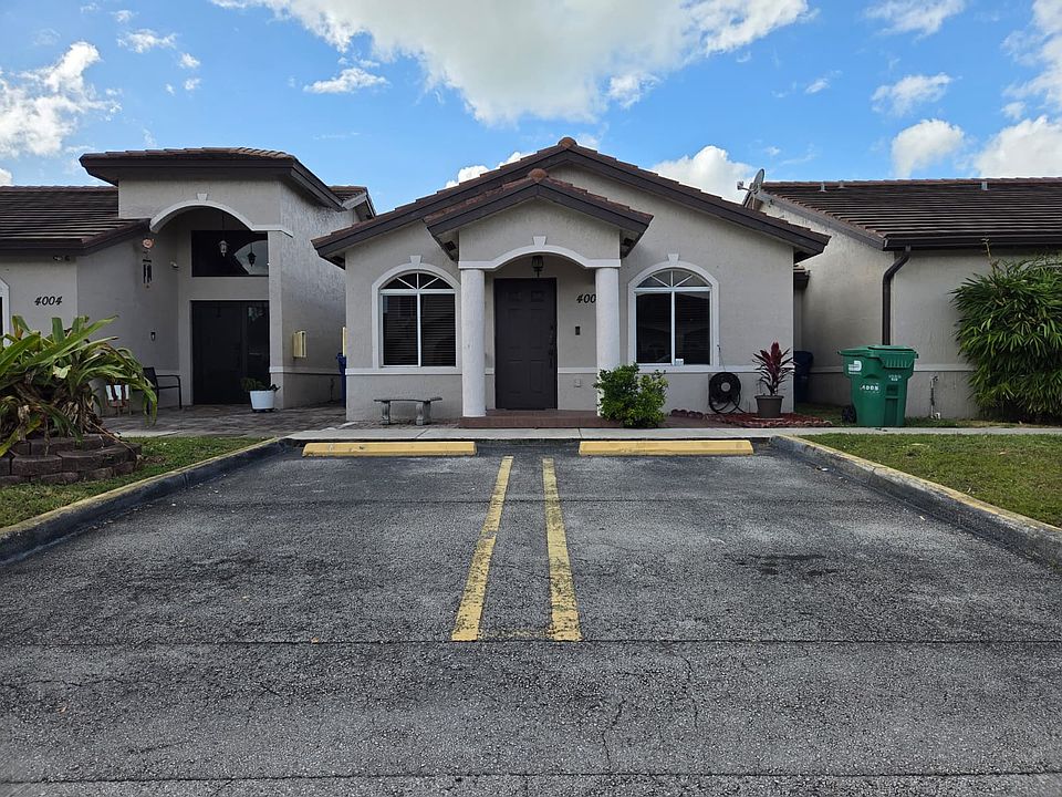 FRONT WITH 2 PRIVATE PARKING SPACES