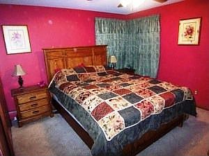 Master bedroom features door to airing porch!