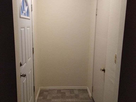 Front door way with coat closet