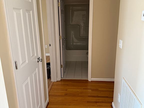 hallway to bath and 2 bedrooms