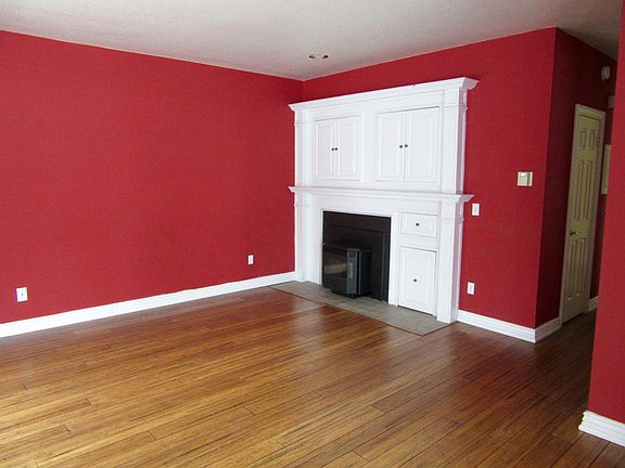 pellet stove & built-in entertainment center in living room