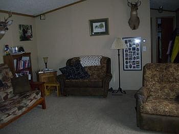 Large living room with vaulted ceiling.