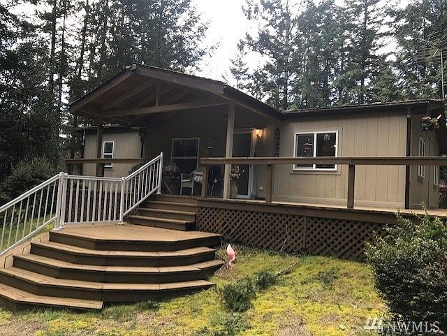 Well built covered porch offers a nice perch