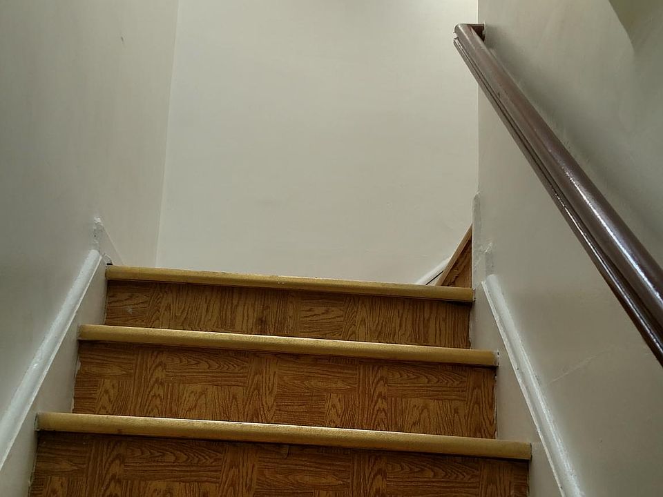 Stairs and skyline to upstairs apartment.