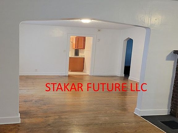 view from front door thru dining room to kitchen