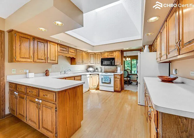 Kitchen with large skylight, capturing both moon & sun rays
