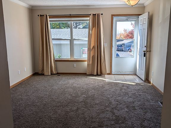 View of Living room window and entry