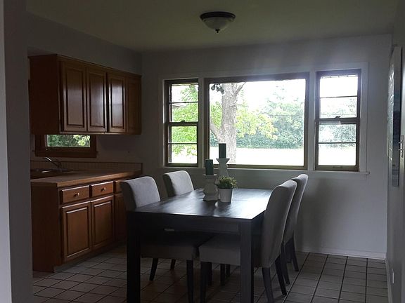 Beautiful view of field from eating area of kitchen.