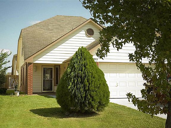 Another view of the front yard. This home features many great updates! Features include an alarm system, double paned windows and more!