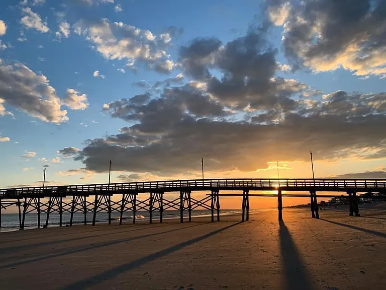 Enjoy a stroll or stay and fish on one of Oak Islands's two piers.