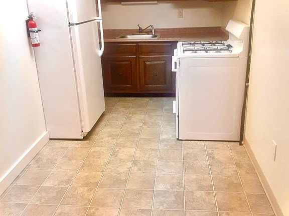 Apt 4G has a large eat-in kitchen -- bring your table and chairs and enjoy home cooked meals.