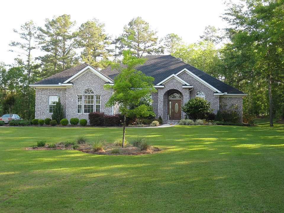 6000 Colonel Scott Dr. Full brick ranch with architectural shingles. Built '04